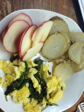 2 eggs scrambled with spinach and two tsp of feta, pepper and garlic. 1 sliced apple and 1/2 of a roasted baked potato with salt and pepper.  